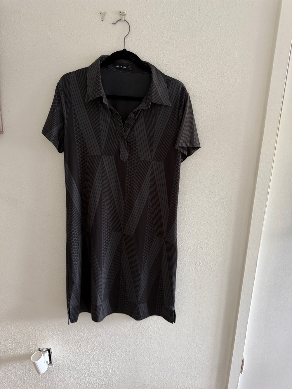 Manaola Black Geometric Polo Dress